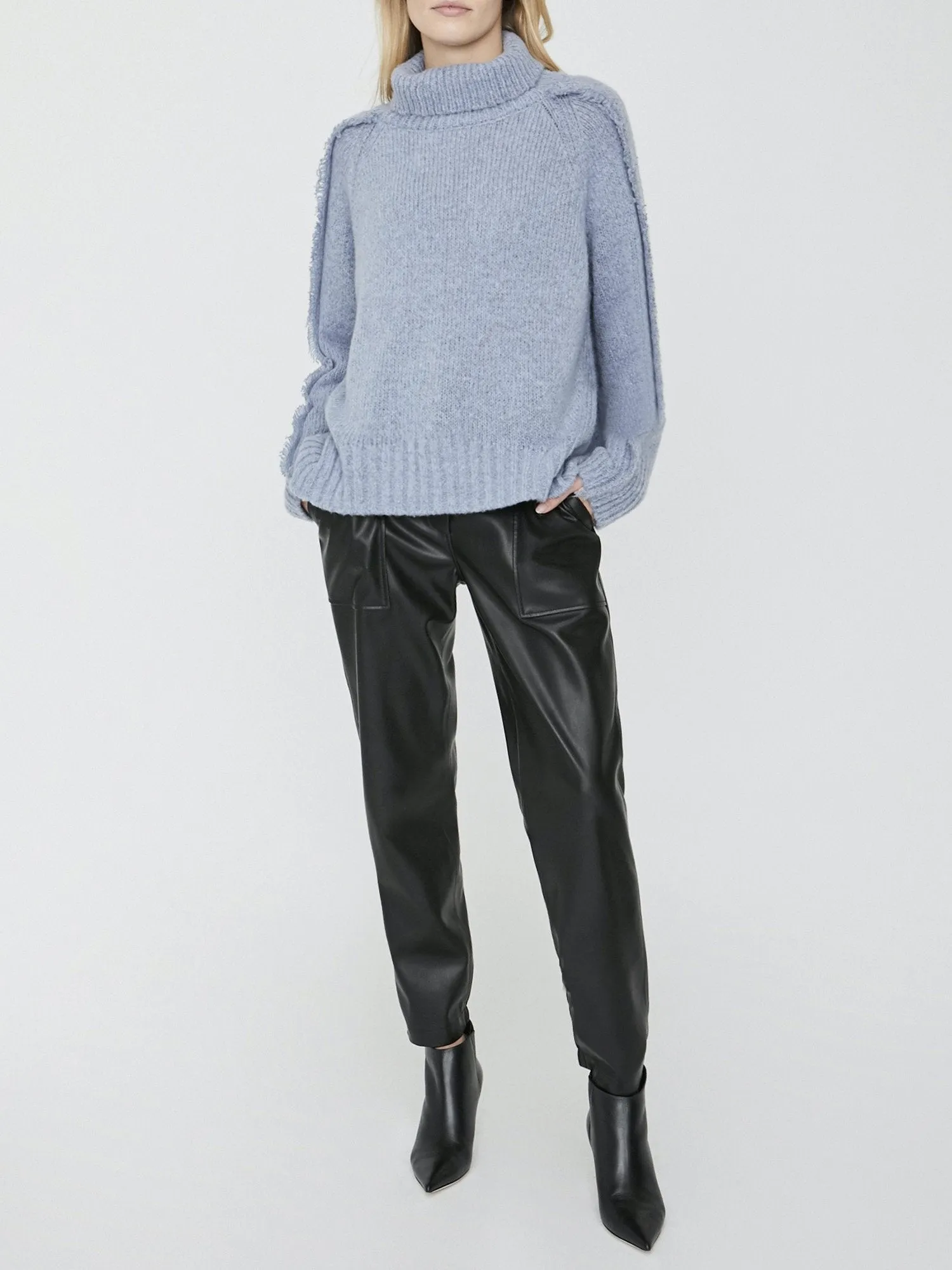 The Odene Fringe Turtleneck